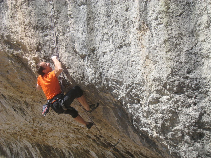 The end of the opening boulder problem--going for the flake.