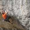 The end of the opening boulder problem--going for the flake.