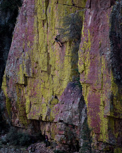 Mike Vaughn cruising past the roof on Vitamin M; Janelle belays on a chilly day.