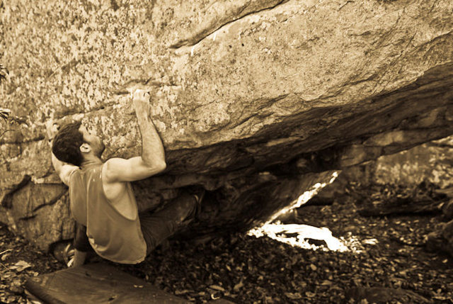 Aaron James Parlier on "Austins Seam"(V7) at the FEA Boulder.