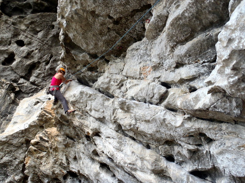 At the end of Scary Mary at the crux.  Yangshuo China.