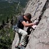 Wade Forrest done with the traverse crux, and closing in on the finish of Lucky Old Sun 5.10+. Great exposure for the backyard.