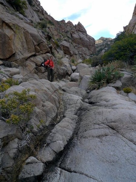 Much of the approach in through this rocky dry riverbed.