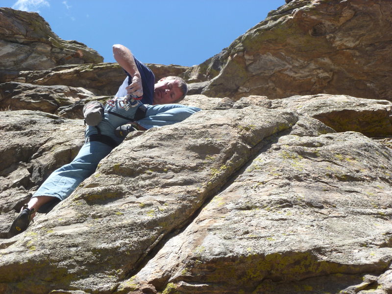 Above the lower crux at a nice stance.