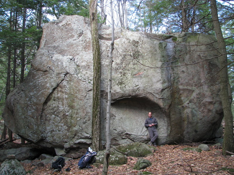 The "easy" east side of the Mowgli Boulder. There is a fixed line on the tree for getting up or down from the top