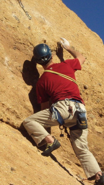 Negotiating the crux bulge on "Yellow Rose of Texas."