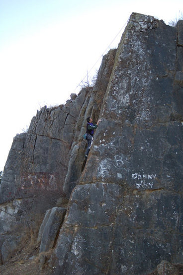 Buddy climbing the Arete