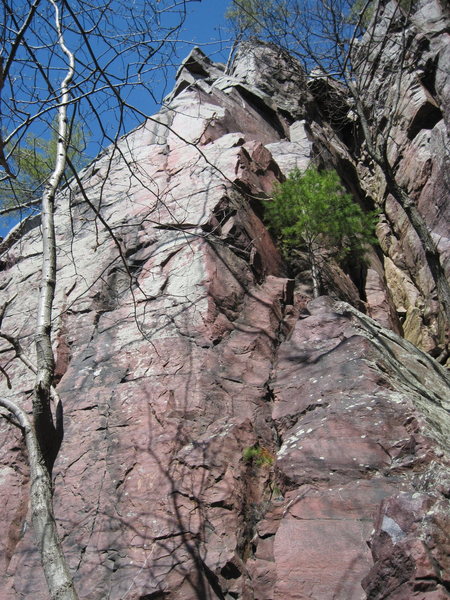 Climb right of the arete, then cross over to left side 2/3 of the way up.