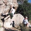 My father spotting me on a boulder problem at Castle Rocks State Park, Idaho 2008