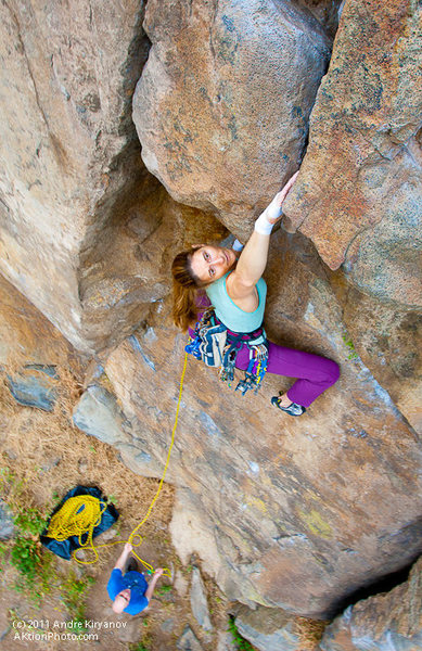 Leah Sandvoss pulling the roof on "Kathy's Memorial", 5.10a at Mission Gorge, San Diego, CA