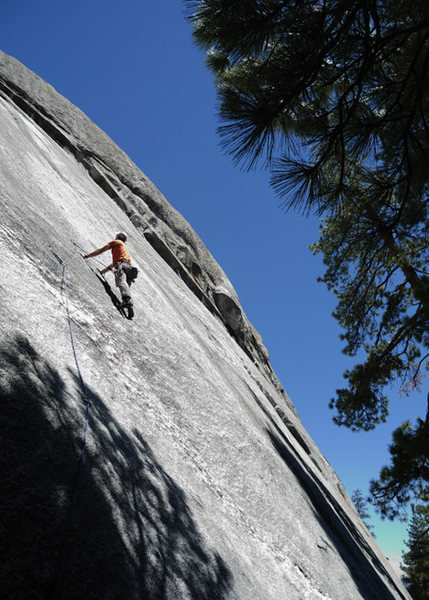 Romain Wacziarg, past the crux and cruising, on Red Mushrooms (5.10c) at Dome Rock.