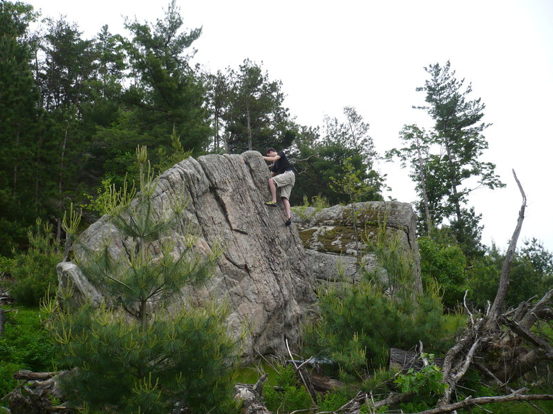Paul on a boulder that doesn't appear to shrink when he steps onto it.