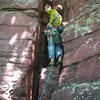 Mike Sohasky starting up the first pitch of adventure climb "Jungle Gym" on toasty June day.  Major Mass, Devil's Lake.