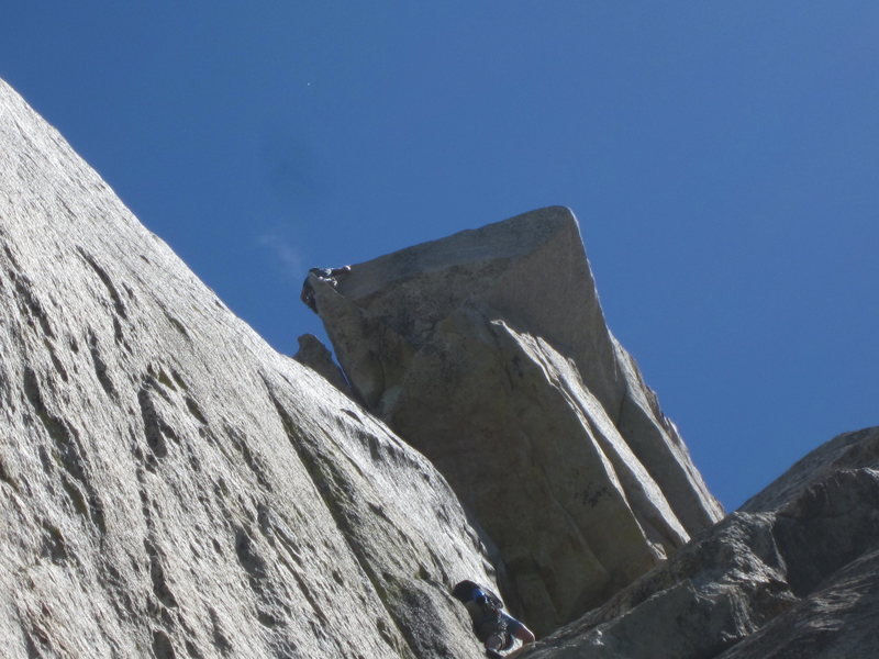 Rob takin on the second pitch of Open Book in the foreground and an unknown climber on the "Traitor Horn" 