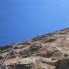 Looking up at the highly featured rock of pitch 3 Heart of Stone.