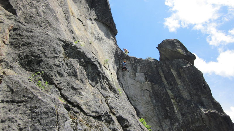 Unknown climber working out the Crux sequence of The Warrior on TR.