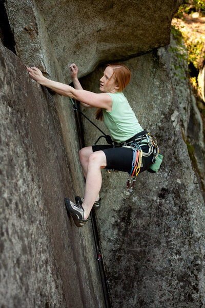 Here is a photo I shot of Lisel Petersen climbing the route out to the left.  10+  www.codytuttle.com