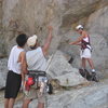 Giving some beta to my sister's boyfriend since this is his first time climbing outdoors.