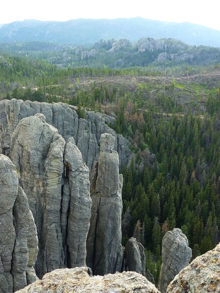 Three ugly dudes on top of Spire 1, taken from spire 4.