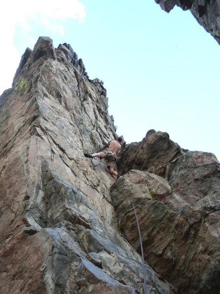 Mike Keegan nearing the crux on Hip Op.