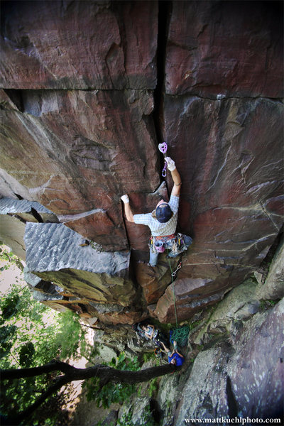 Placing the old school #4 Camalot in the lower handcrack. Summer 2011<br>
<br>
Photo Matt Kuehl