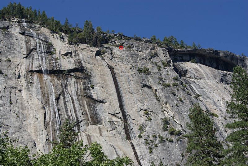 This shows the scale of the climb.  Inside the red "O" at the top center are two climbers at the 15th pitch anchors which is the first rappel station.