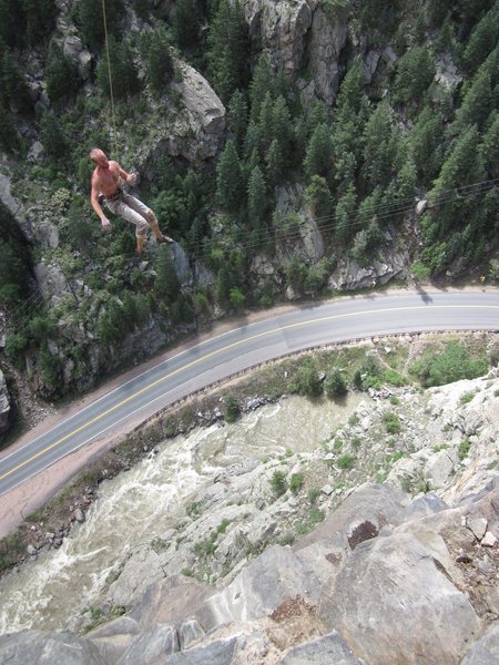 Lance swinging back in off the arete. <br>
Some sweet exposure nearly 500ft of air to the river.