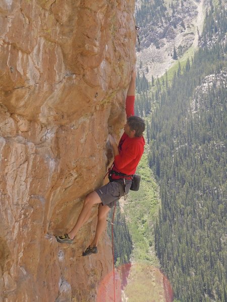 Going through the crux bulge on Glory Hole.