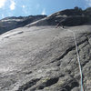 Pitch 3: Some run out on slab. Crux is the crack right/above climber