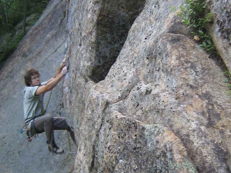 Michael Farnsworth flinging himself into the crux moves on the FA.