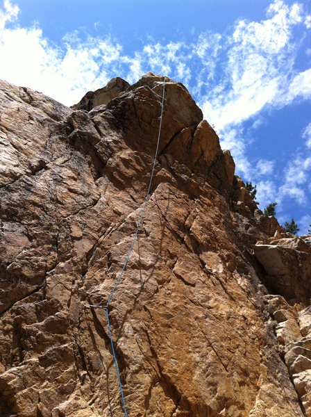 The route tends to wander just a bit and is over vertical all the way past the 4th bolt. The exit moves are spicy on granular rock. 