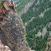 Griffin at the belay, bringing Andrew up to the airy belay.