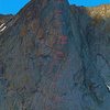 Detail topo of ITTIA pitches from the large ledge at the start to near the summit including pitches on Ambush Plaisir. Note that circles indicate belays while arrows are placed generally over or left of the line of ascent. Notes include pitch grades and brief descriptions. Larger arrows indicate rappel anchors.