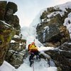 Brian Childress on the first ascent of Dismas.  The second pitch curtain can be seen above.