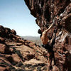 I'm free soloing Sweet Pain in 2nd pullout Red Rocks.  I wore sandals since the rock was too hot!