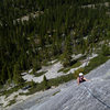 Ellen prepping to pull over the edge of the flake and begin the crux traverse.<br>
<br>
June 2011