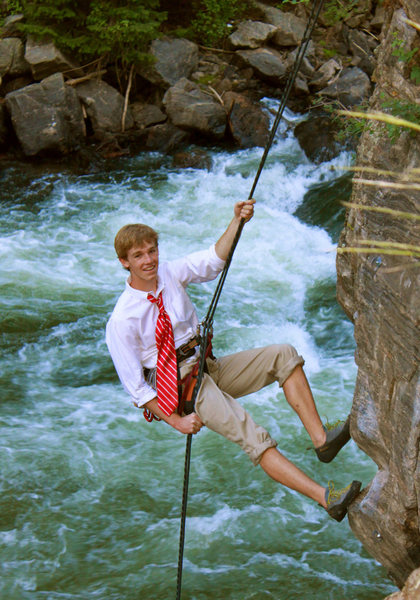 Senior photo while rappelling.  Interesting climbing this one in dress clothes.