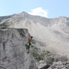 Mike B on the V0 Arete with Turtle Mountain in the background.<br>
<br>
Photo by Levi Ziegler