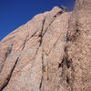 Steve Gladbach on summit after the final cliff band.