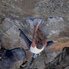 Moving through the all too classic rail traverse on a sultry 90 degree day... James Q Martin handling the rope.<br>
<br>
All photos in this series taken by Wade Forrest