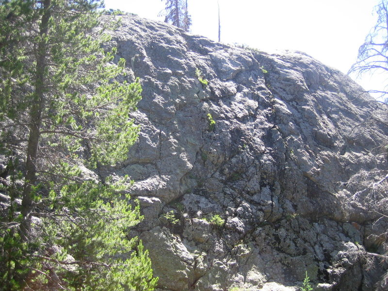 Middle section of the crag, from route 4 on the left to route 7 on the right.