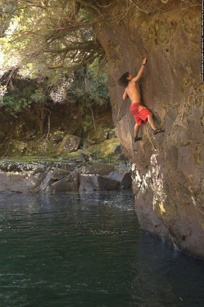 Deep-water bouldering over the Cochamó River in the Cochamó Valley.