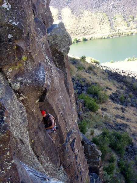 Reggie at the Gargling Vinegar anchors with the Boise River in the background.  Photo taken from Macabre Roof anchors.