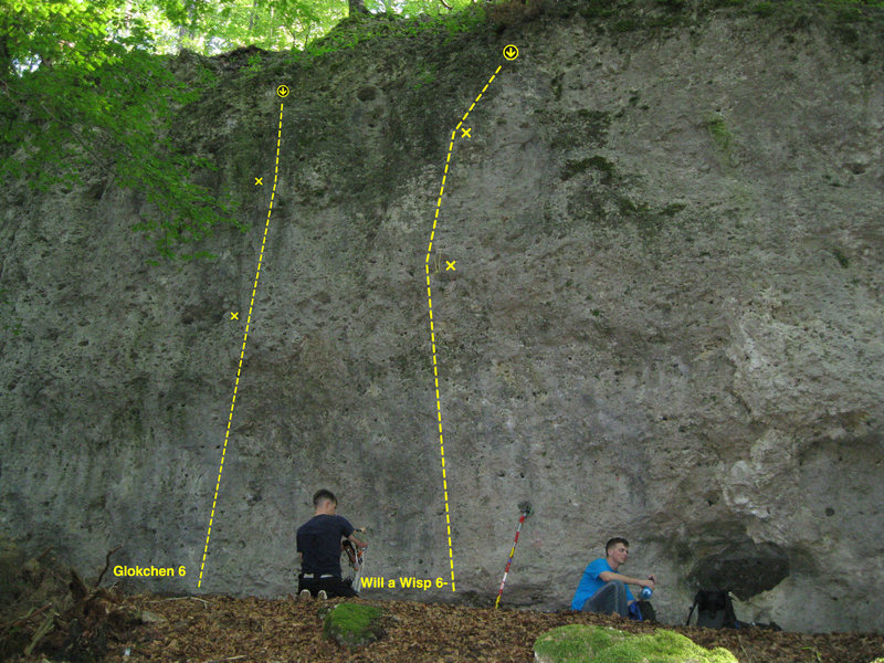 The climbs furthest to the right on the left side (passing the cave and keep walking.