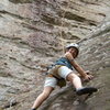 Red River Gorge Summer Trip 2011.  Araceli climbing.