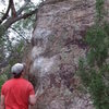 Arien checking out the Soggy Dog problem on the Gatekeeper Boulder.