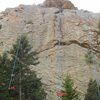 3 climbs all bolted, good rock, face climbing, shaded. The leftmost route is 5.9, the middle is 5.10a, and the right is 5.11a.