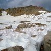 The notch at upper right can be seen from the flat meadow area above the waterfall. Topping out over that notch would land you on a high sandy plateau with your first view of the actual Conness summit.  26 Aug 2011.