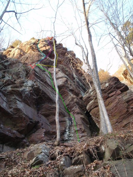 P1 - Green to the chains.  Original P2 follows Yellow through a dirty erosion gully that needs wide gear.  Purple and blue are alternative top pitches that offer better climbing and gear in the 5.8 range, though the rock is not that good up there.