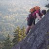 Ben Botelho traversing near the top of P3 of Catharsis(5.5)